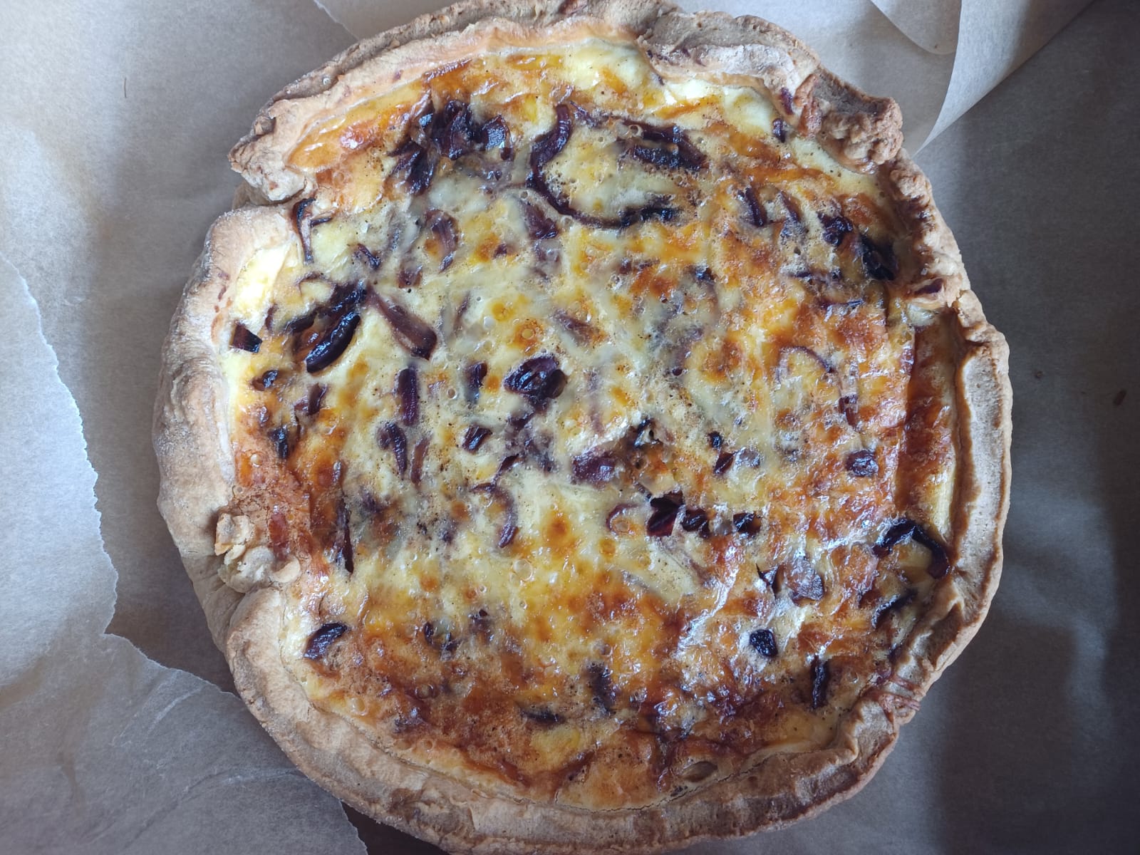 Homemade caramelised onion quiche
