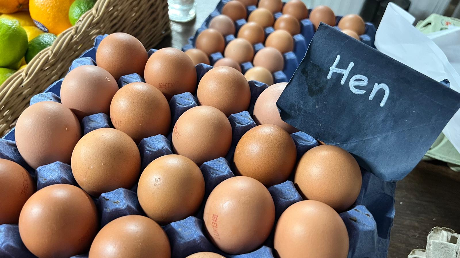 Hen eggs and the Hen Eggs sign — wide shop view