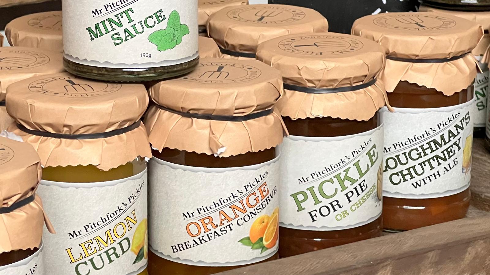 Mr Pitchfork's pickle jars on the shop shelf — wide view