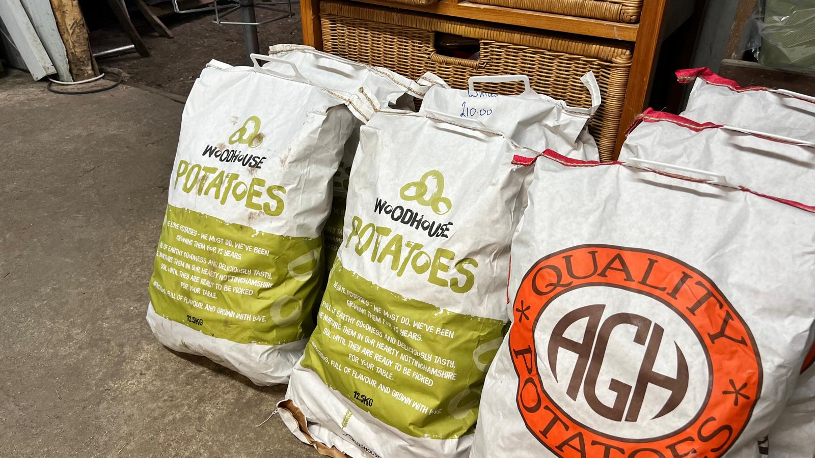 Branded potato sacks on display in the farm shop